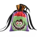 Halloween drawstring candy bag featuring a cute green monster face gift pouch for kids - Candy Bag Style 02 (WSJTGD) / 16x23.5cm