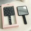 Square black handheld makeup mirror with cute eyelash print in a premium pink box - With Color Box / 9*16cm-0.5cm Thickness / Black