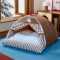 Cozy brown semi-enclosed pet tent bed featuring striped curtains and a soft blue cushion - S / Cartoon Stripes