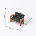 Miniature black dollhouse sofa with dimensions 3.5x1.8x2.1cm on white background. - Leather Sofa