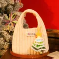 Small cream knitted Christmas gift bag with a colorful tree charm and LibreJon label. - Snowy Bell Pendant Style (2025SD) / Champagne (Snowy Bell Pendant Style)
