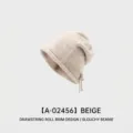 Warm beige knitted slouchy beanie with stylish rolled edge and drawstring detail - One Size (54-58CM) / Drawstring Regular Version / Beige