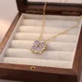 Collar chapado en oro con colgante de corazón de trébol y piedras moradas. - Estilo Plegable Magnético de Trébol de Cuatro Hojas (X2986) / Púrpura