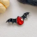 Halloween devil bat brooch featuring a faceted red crystal and black enamel wings - Bat Style (XZ240) / Red