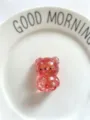 Adorable glittery pink transparent gummy bear squeeze toy for stress relief and fun - Red