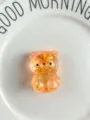 Adorably cute orange glitter transparent jelly bear squishy toy for effective stress relief - Orange
