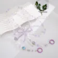 Elegante lavendel en witte parel kralen crossbody telefoon koord met een strikje. - Paars