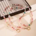 Bunte Glastaschenkette mit rosa Perlen und goldenen Ringen für Handtaschen - Rissperlen + Bambusknoten Umhängekette / Rosa