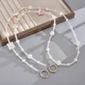 Weiße Glasperlenkette mit rosa Stern und Smile-Herz-Anhängern für Handy oder Tasche - Fünf-zackiger Stern & Kissen Crossbody Kette / Weiß
