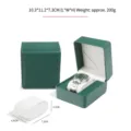 Premium grüne PU-Leder Uhrenbox mit Klappdeckel und weichem weißem Samt-Uhrenkissen - Abgerundetes Litschi-Muster / Dunkelgrün