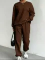 Stylish women's brown cable-knit two-piece set featuring long sleeve top and jogger pants - S / Top And Bottom / Coffee