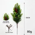 Artificial Christmas pine branch with red berries for DIY home decor and holiday styling - Norfolk / 50cm