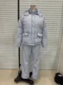 Full-length detail of light blue striped winter puffer jacket and wide-leg pants set - S / Top And Bottom / Blue