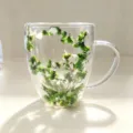Double-walled borosilicate glass mug with decorative green and white dried flowers. - 350ml-Green and White Dried Flowers
