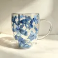 Elegant double-walled borosilicate glass mug featuring blue dried flowers inside - 350ml-Blue Hydrangea Petals