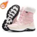 Water-resistant pink women's snow boots featuring white faux fur lining and lug sole - 36 / Pink