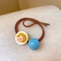Korean INS quirky hair tie with cute cartoon face and blue bead for women styling. - Yellow Hair Girl