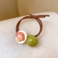 Cute quirky hair tie with human face charm and green bead, high elastic brown hair band - Orange Lady