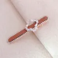 Elegante strass eendenbek haarspeld met bruine stof en klaver kristal ontwerp voor dames. - Strass Klavertje (YU655) / Bruin