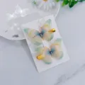 Schattige kinderen vlinder haarspelden set met mesh vleugels en gouden eendebek clips. - Groen Paar