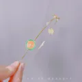 Metalige fruit haarband met emaille sinaasappelschijf en parel, minimalistisch haaraccessoire. - Watermeloen