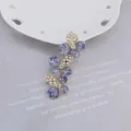 Paarse bloem haarkandelaar met parels en strass, elegante zijklem voor dames en meisjes. - Paars