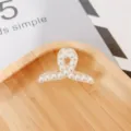 Pearl hair claw clip for women, elegant transparent hair accessory for daily styling and bangs. - Cross Style