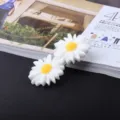 Close-up detail view of the adorable white daisy hair clip showcasing its cute floral design. - Two Flowers Hair Clip
