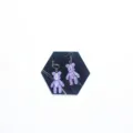 Detail view of purple glitter bear earrings featuring asymmetric clip-on and hook design. - Hook Style / Purple