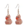 Detailed close-up of cute resin duck earrings with fishhook design, charming and playful. - Classic Yellow Duck Style
