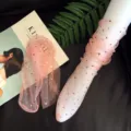 Sheer mesh star print socks detail shot, pink sheer hosiery closeup, fashionable hosiery design. - One Size / Pink