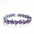 Close-up detail of purple embroidered flower lace choker necklace with green leaf accents. - Purple