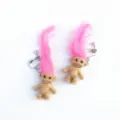 Vintage quirky troll doll clip-on earrings with bright pink long hair for fun street style. - Pink Clip-on