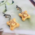 Boucles d'oreilles ours biscuit mignonnes, clips d'oreilles en résine kawaii pour femmes. - Boucles d'oreilles à clip