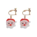 Weihnachtlicher Weihnachtsmann Clip Ohrringe aus Harz fuer den festlichen Ohrschmuck. - Ohrclips / Weihnachtsmann