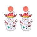 Close-up detail of cute Christmas snowman acrylic earrings with glitter studs and holiday vibe. - Size 6