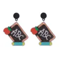 Detailed closeup of cute back-to-school acrylic chalkboard and apple earrings for teachers. - Blackboard and Pencil Style (E2024-47)