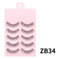 Detaillierte Nahaufnahme von fünf Paar natürlichen, buschigen künstlichen Wimpern. - Angelschnur Stil (ZB34) / 5 Paar Set