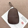 Brown genuine leather coin purse clutch with wrist strap and contrast white stitching details. - 20*3*15 cm / Coffee