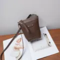 Genuine leather crossbody bag for women, stylish brown shoulder phone bag for daily commuting. - Coffee