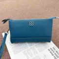 Genuine leather coin purse and wristlet bag, stylish blue clutch for women with metal clover. - Teal