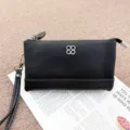 Black genuine leather coin purse clutch phone bag with stylish clover hardware, minimalist. - Black
