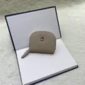 Mini leather coin purse card holder with elegant metal flower detail for women daily use. - Off White
