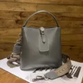 Grey leather bucket bag with top handle and patterned wide strap, elegant commuter daily handbag. - Premium Grey