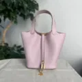 Borsa a secchiello in pelle rosa chiaro con lucchetto e manici superiori per donne stile casual. - Rosa viola da sogno con fibbia dorata