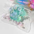Cute cat paw squishy stress relief toy detail with glitter pearls and transparent packaging design - Green Paw Squishy