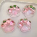 Pink cat paw squishy stress relief toy with cute glitter jelly design for fun relaxation. - Strawberry Cat Claw