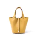 Borsa a secchiello in pelle gialla con manici superiori e chiusura con lucchetto elegante. - Giallo Milton con fibbia dorata