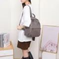Stylish grey genuine leather backpack for women, casual travel daypack with multiple pockets. - 27*14*34cm / Gray