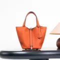 Orange genuine leather bucket bag, classic minimalist chic handbag for women daily use. - 18*13*13 cm / Orange with Silver Buckle